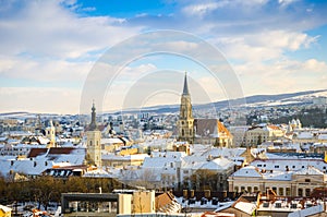 Cluj Napoca view on a sunny blue cloud winter day with St Michael Church