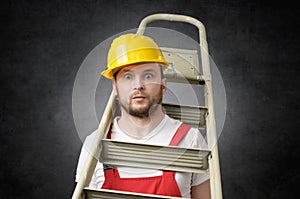 Clumsy worker with ladder