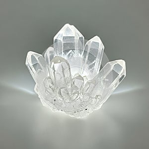 The crystals exhibit a hexagonal structure with pointed terminations