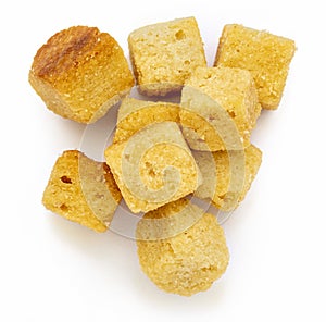 Cluster crispy croutons. Cubes of bread toasted and fried in oil. Isolated white background