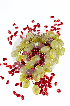 Cluster of grapes and pomegranate grain