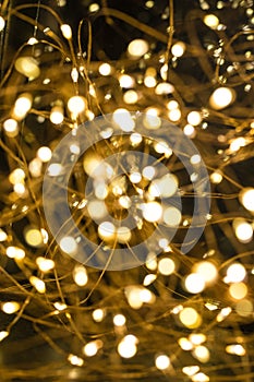 Cluster of micro LED string lights. Shallow depth of field, out of focus blurred