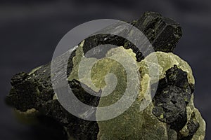 Cluster of prehnite crystals, their pale green translucence a hallmark of this unique African mineral, juxtaposed with stark black photo