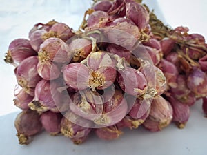 Close up of red onions with white background photo