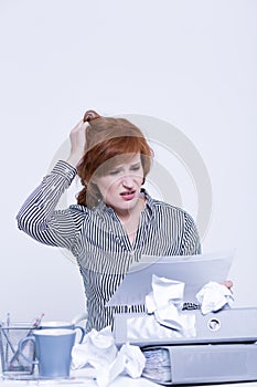 Clutter on desk during work photo