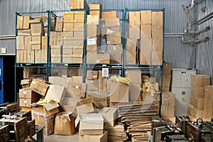 Clutter stock cardboard packing boxes in the factory photo