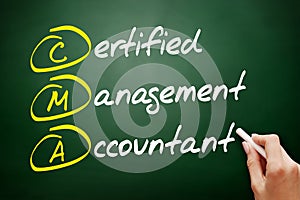 CMA - Certified Management Accountant acronym, business concept on blackboard photo