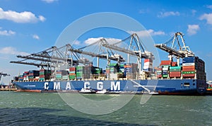 CMA CGM Container ship being loaded by gantry cranes in the ECT Shipping Terminal in the Port of Rotterdam. The Netherlands -