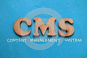 CMS Content Management System  text words typography written on blue background  life and business motivational inspirational