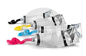 Cmyk paint tubes squeezed