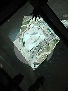 CN Tower glass bottom floor, view looking down at from very high up