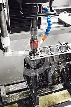 CNC Automatic Cylinder Honing Machine of engine. Car workshop, machine with a Computer numerical control.