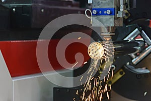 The CNC fiber laser cutting machine cut the stainless pipe