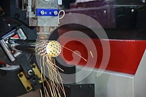 The CNC fiber laser cutting machine cut the stainless pipe