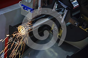 The CNC fiber laser cutting machine cut the stainless pipe