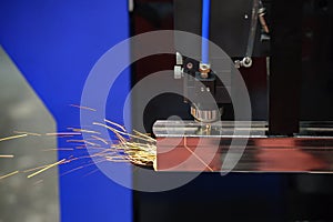 The CNC fiber laser cutting machine cutting the stainless pipe.