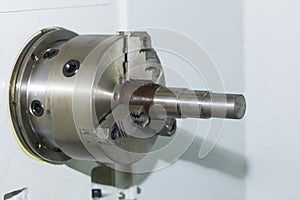 Cnc industrial lathe turning spindle chuck and product part on machine