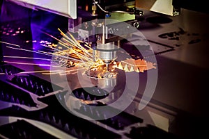 CNC Laser cutting of metal, modern industrial technology.