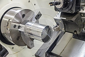 The CNC lathe machine clamping steel rod .