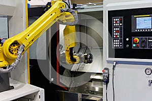 CNC lathe machine and robot