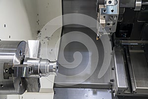 The CNC lathe machine in setup work pieces process chucking the metal shaft  parts.