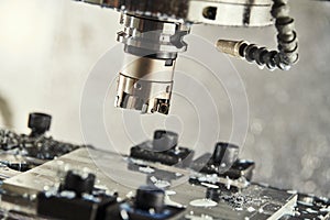Cnc machine at metal work industry. Milling precision manufacturing and machining