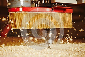 Cnc machine working, cutting wood. Woodwork industry.