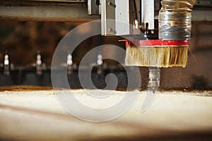 Cnc machine working, cutting wood. Woodwork industry.