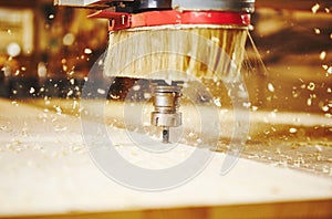 Cnc machine working, cutting wood. Woodwork industry.