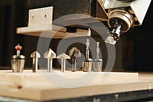 Cnc machine working, cutting wood. Woodwork industry.