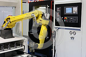 CNC machining center with automatic loading system