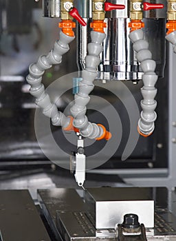 CNC machining center setting work metal by CNC operator