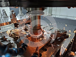 Cnc milling of hardened steel with sparks - closeup with selective focus and blur