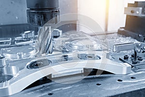 The CNC milling machine cutting the aluminium automotive part