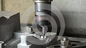 The CNC milling machine cutting injection mold part with ball end mill tool