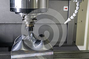 The CNC milling machine cutting injection sample part by solid ball end mill tool