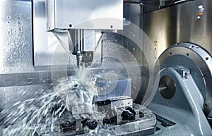 CNC milling machine. Cutting metal modern processing Hi-technology machining concept.