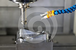 The  CNC milling machine cutting the mould part with the solid ball end mill tool.