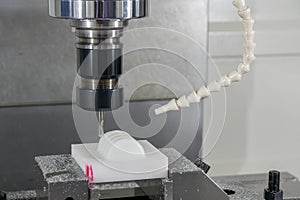 The  CNC milling machine cutting the nylon 6 material part with ball end mill tool