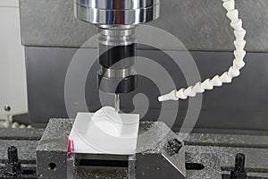 The CNC milling machine cutting the nylon 6 material part with ball end mill tool