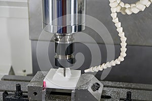 The CNC milling machine cutting the POM material parts by solid ball endmill tool