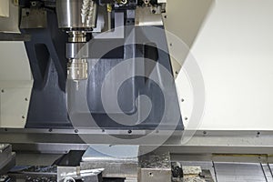 The CNC milling machine cutting the sample part.