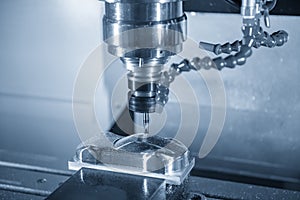 The  CNC  milling machine cutting  the sample parts by solid endmill tool.