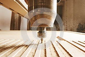 CNC milling machine. Machine tool in wood factory with drilling machines.