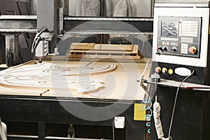 CNC milling machine. Machine tool in wood factory with drilling machines.