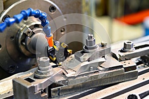 Cnc milling machine machining metal work piece in an industrial