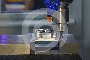 The CNC milling machine rough cutting the aluminum housing with flat end mill tool