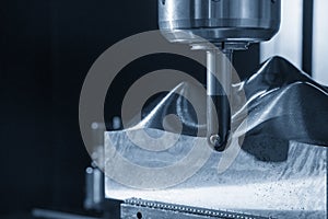 The CNC milling machine rough cutting  the injection mold parts by indexable ball tools.