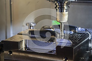 The CNC milling machine rough cutting the injection mold parts by indexable endmill tools.