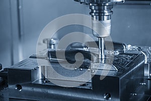 The CNC milling machine rough cutting  the injection mold parts by indexable  endmill tools.